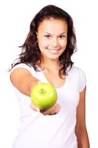 Girl with green apple